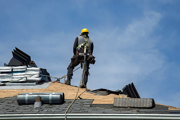 Professional Gutter Installation technician working in Deer Island, OR